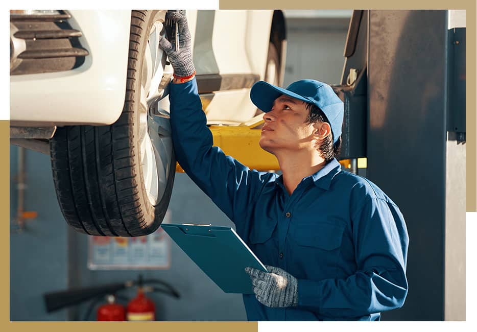 mechanic checking car